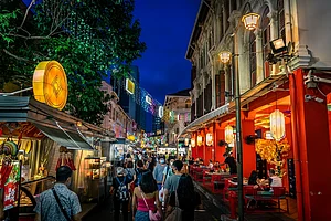 Derek Teo/Shutterstock : A street market in Chinatown